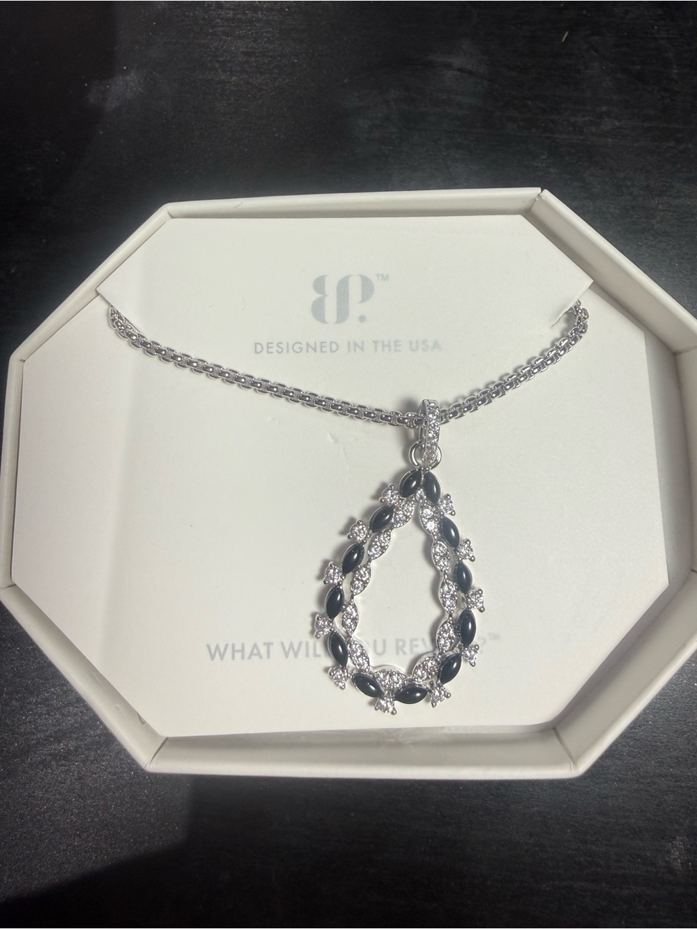 Silver Teardrop Pendant Necklace with Black Accent Stones